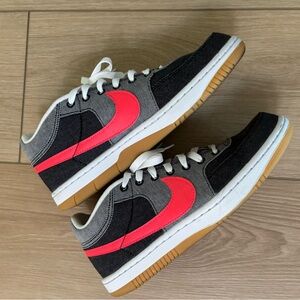 Nike Black and White Sneakers with Pink Swoosh